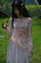 Pastel pink top with ribbon