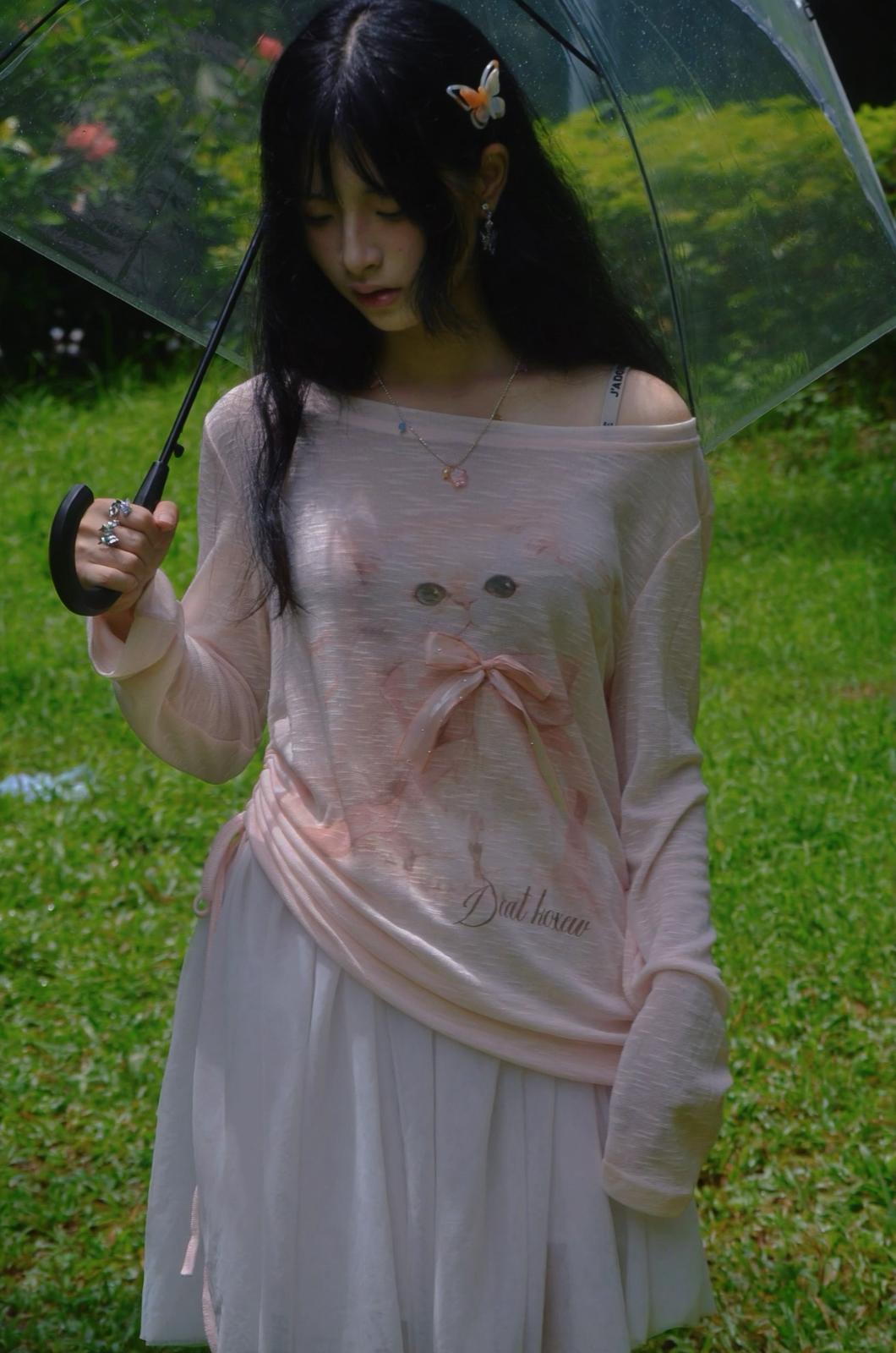 Pastel pink top with ribbon