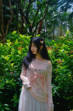 Pastel pink top with ribbon