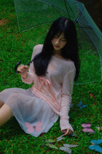 Pastel pink top with ribbon