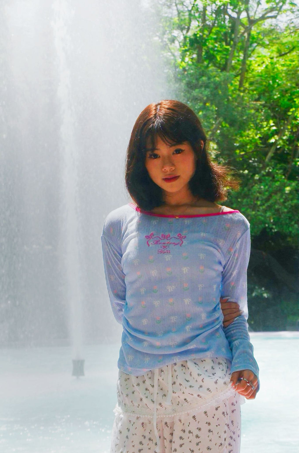 Light blue sheer floral print top