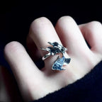 Wave ring with blue crystals fish